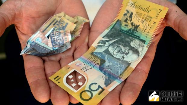▲據澳洲政府的統計數據顯示，在過去2年間，市面上有超過3.3萬張50元澳幣面值的假鈔流竄，而且這些假鈔的品質甚至精良到連銀行檢測系統都難遍真假。（圖／翻攝自smh）