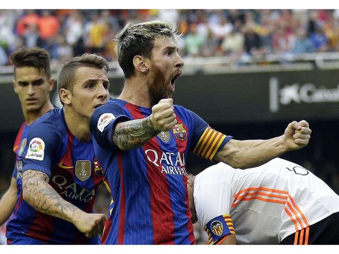 Messi轟進絕殺十二碼，興奮握拳狂吼。（圖／美聯社／達志影像）