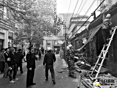 三里屯治理開牆打洞。