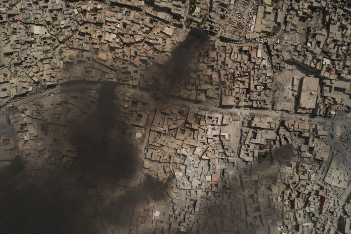 伊拉克第二大城摩蘇爾遭長時間空襲的慘狀。（圖／達志影像／美聯社）