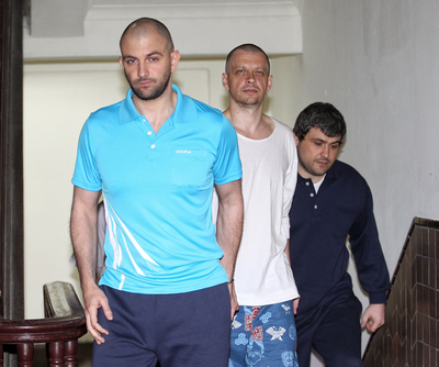 一銀盜領案嫌犯潘可夫（左起）、安德魯、米海爾。中央社記者資料照