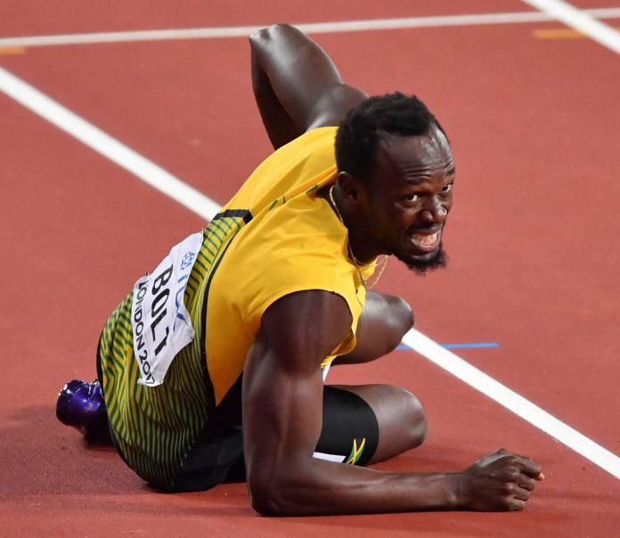 Usain Bolt跌倒。（圖／美聯社／達志影像）