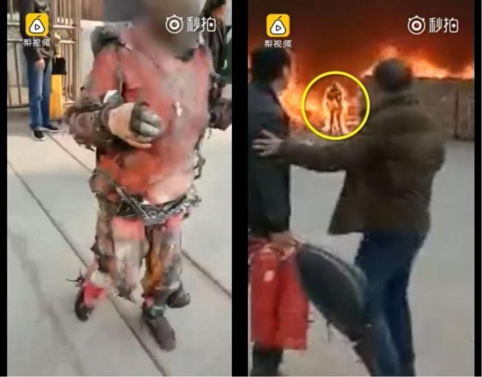 ▲中國大陸一名員工為救手機，不顧一切衝入火場被燒成「火人」。（圖／翻攝自《梨視頻》）