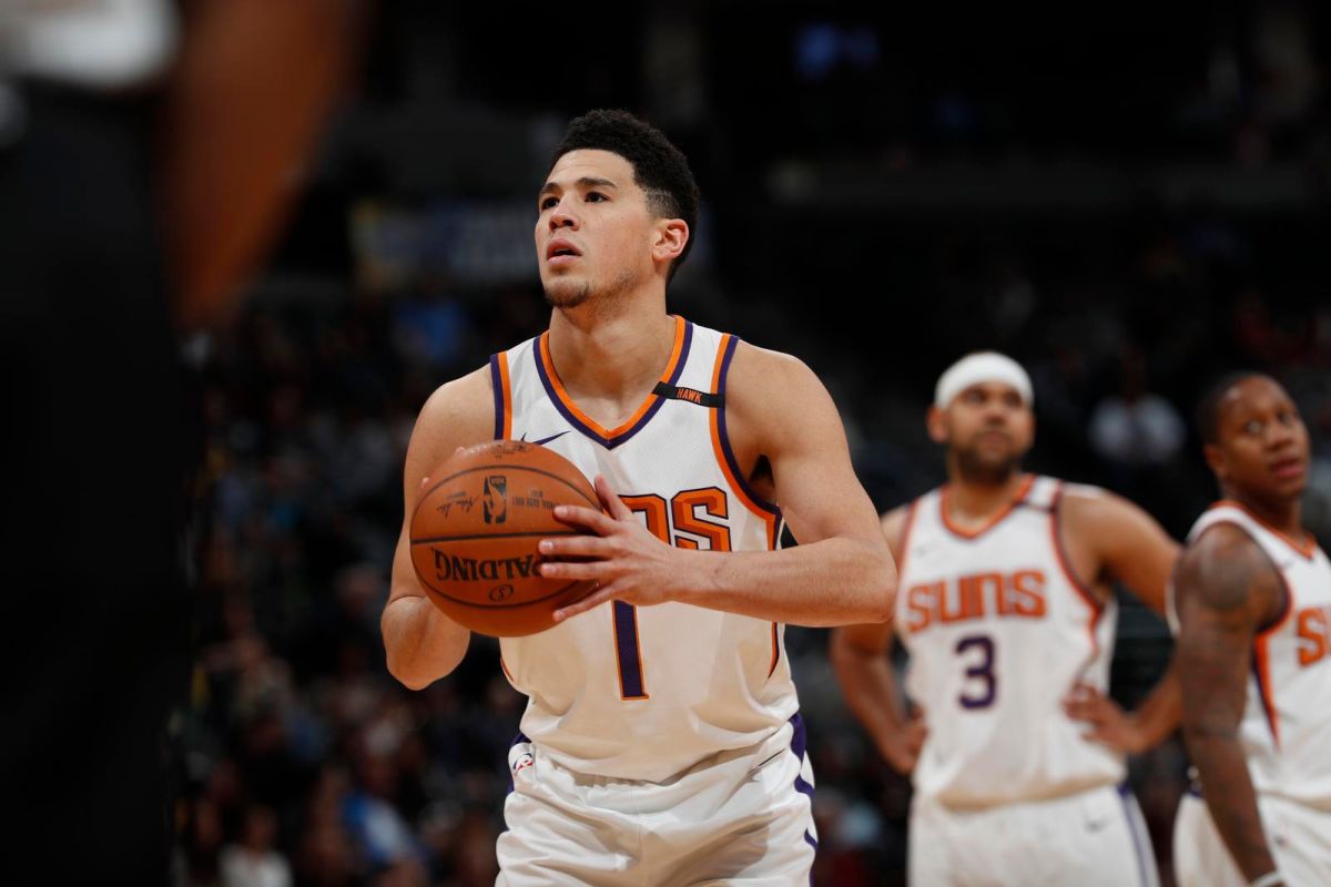 ▲太陽主將Devin Booker狂轟49分，率太陽擊敗金塊拿下第60勝鎖定聯盟最佳戰績。（圖／美聯社／達志影像）