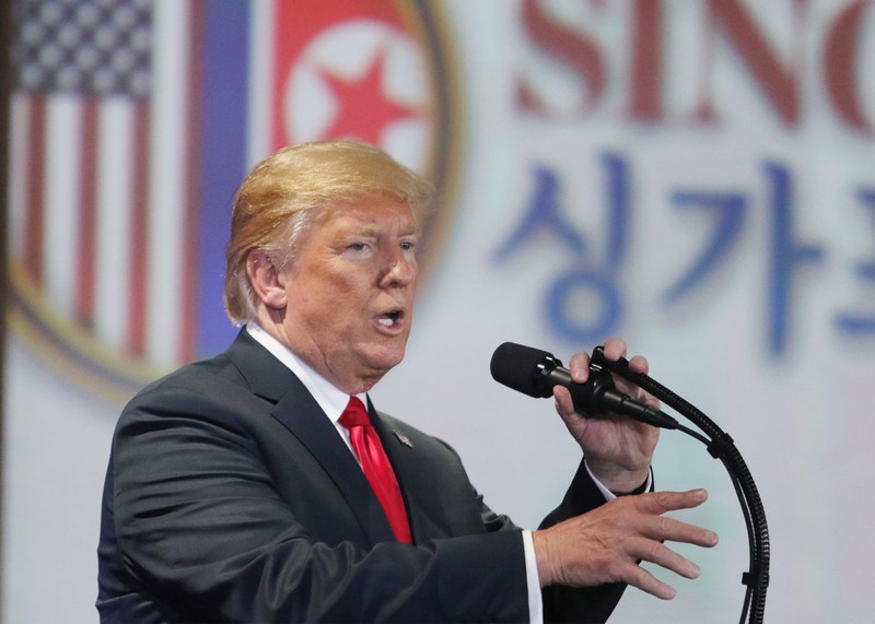 ▲美國總統川普 12 日結束與北韓領導人金正恩的歷史性峰會後舉行國際記者會，形容這場會談直接、有成果。中央社記者黃自強新加坡攝107年6月12日