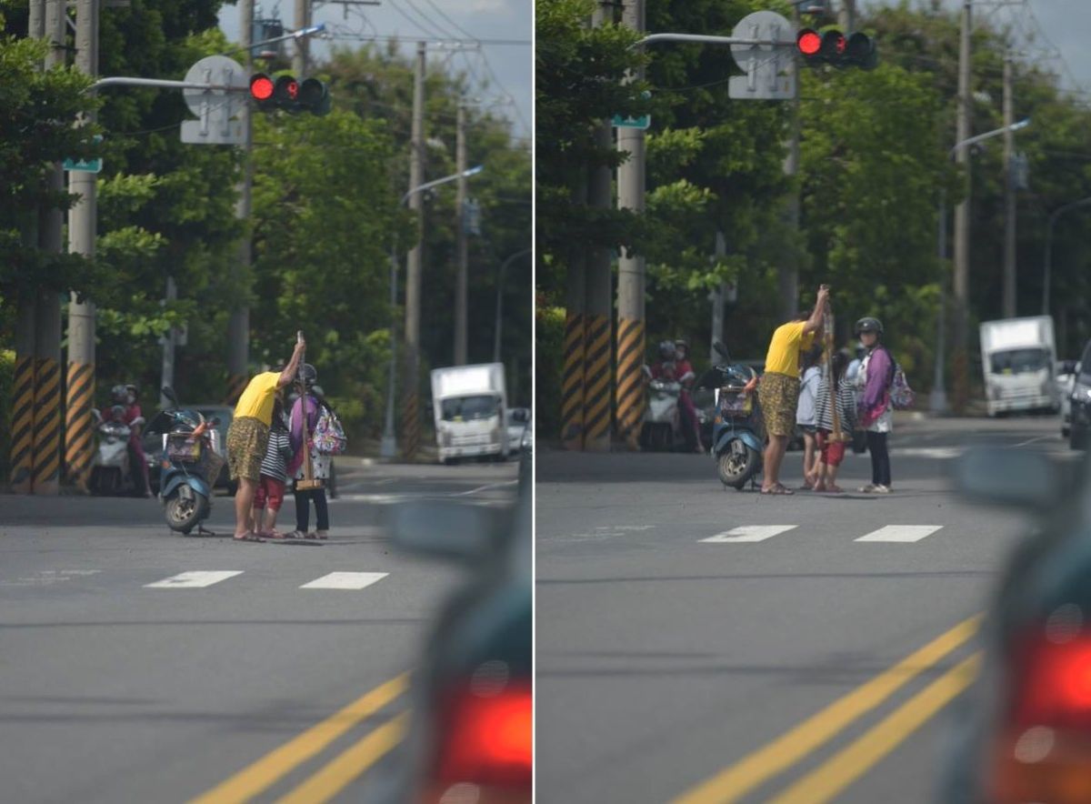 ▲網友目擊一家四口趁紅燈時修補道路，感嘆「政府真的要檢討」。（圖／翻攝自臉書《爆料公社》 , 2018.08.04）