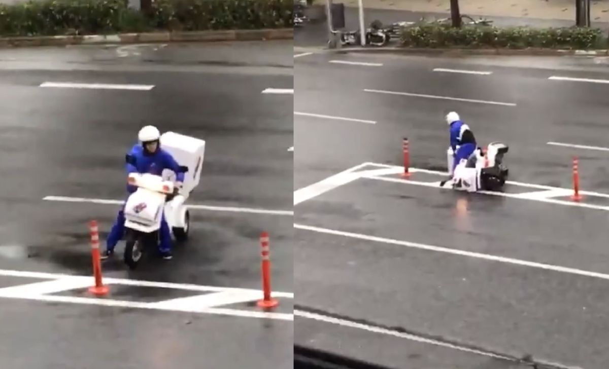 ▲日本外送員在強風中送披薩，但被強風困在大馬路中央，還一度快被吹飛。（圖／翻攝自推特）