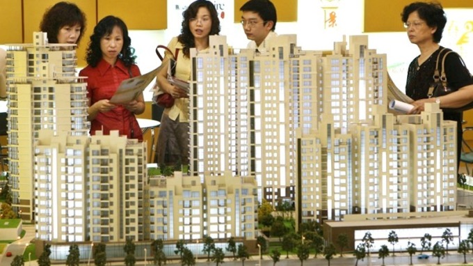 ▲ 明年中國房地產商債務高達人民幣3850億元。