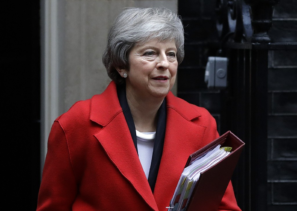 ▲在強生之前，其實有3位保守黨黨魁也是在同黨議員壓力下辭職。圖為2019年宣布下台的前首相梅伊。（圖／美聯社）