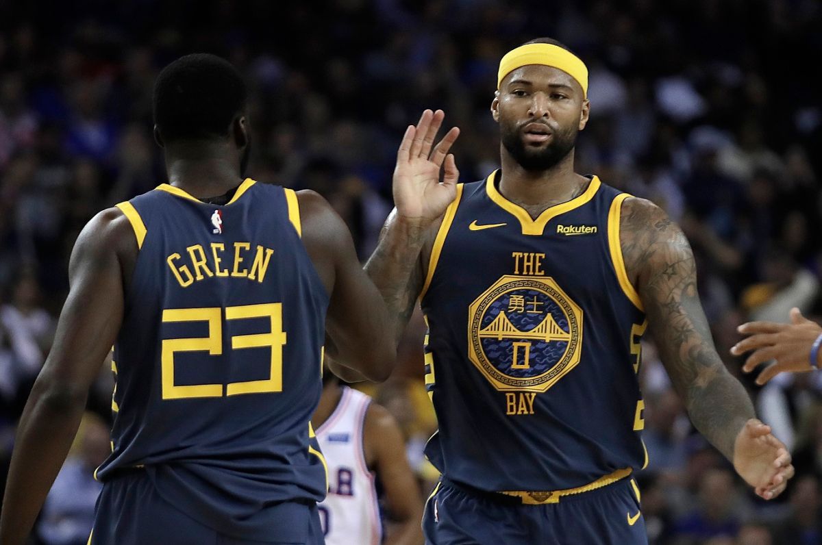 Draymond Green(左)和DeMarcus Cousins。（圖／美聯社／達志影像）