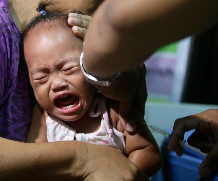 菲律賓爆發麻疹疫情，已有50人死亡，多數是孩童。（圖／美聯社／達志影像）
