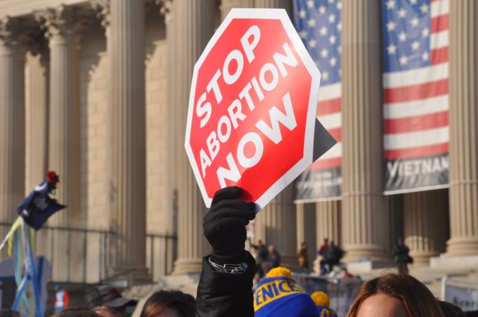▲美國不時有民眾發起反墮胎的街頭運動。（圖／翻攝自 Unsplash ）