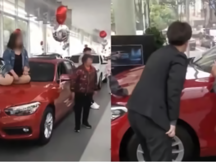▲美腿辣妹坐凹 BMW 引擎蓋，店家傻眼怒報警。（圖／截自Youtube 影片）