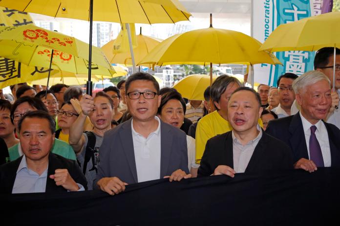 ▲香港2014年佔領中環運動9名發起與參與人士，今（24日）宣布判刑。（圖／美聯社／達志影像）