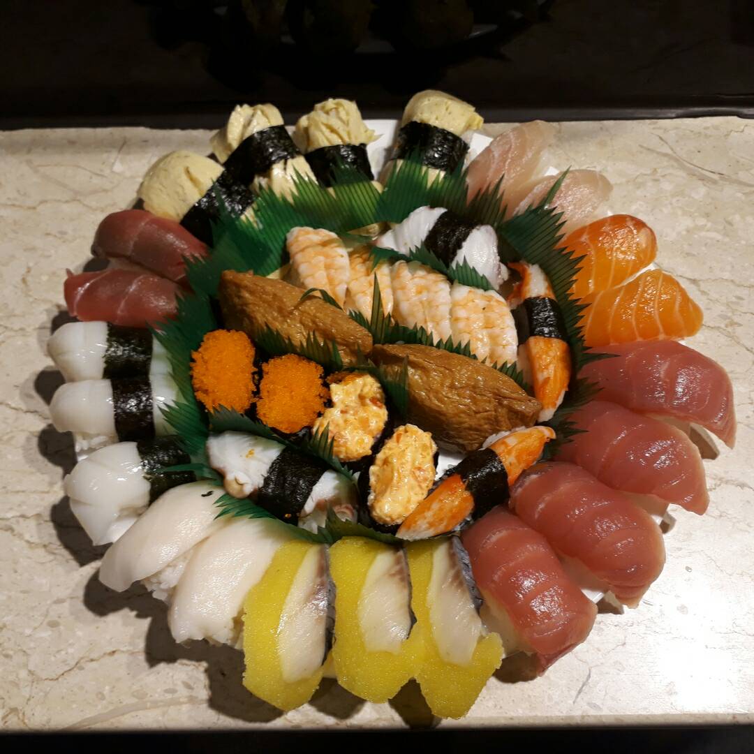 ▲賽夏族的戴維寧在竹東小鎮開設大漁丼，將日本料理美味帶回家鄉。（圖／記者常似虎攝）