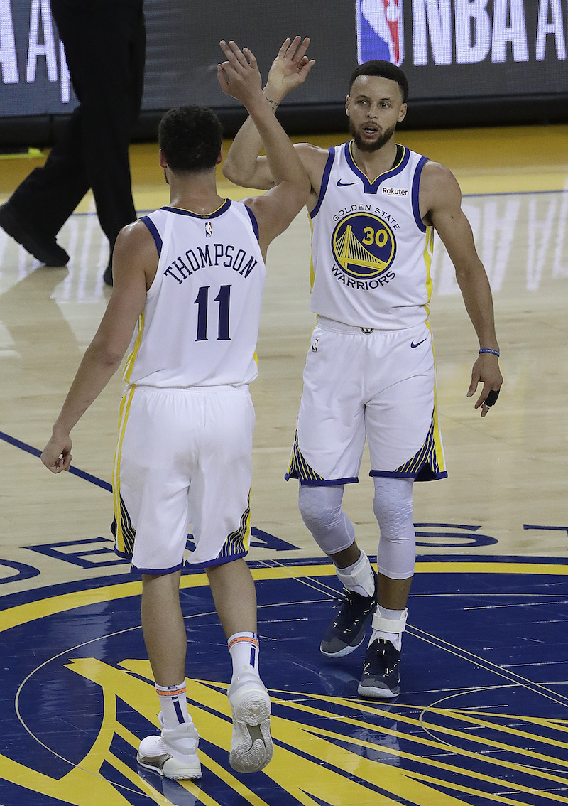 Klay Thompson(左)、Stephen Curry聯手拿下西決G1。（圖／美聯社／達志影像）