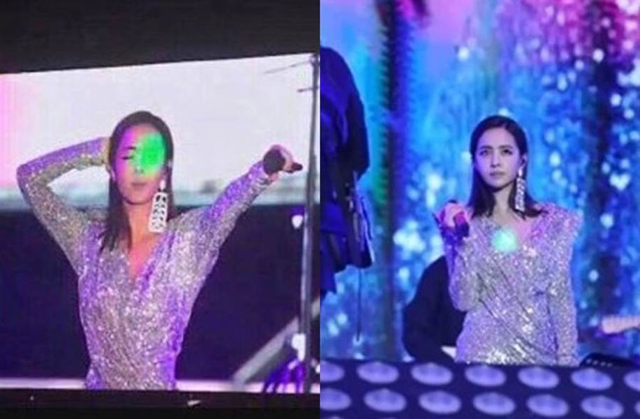 ▲蔡依林台上熱唱，遭雷射筆掃射惡意攻擊。（圖／翻攝微博）