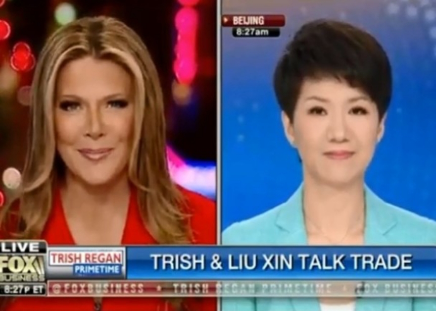 ▲中國環球電視網（CGTN）女主播劉欣，與美國福斯財經頻道女主播雷根（Trish Regan）進行直播辯論。（圖／翻攝節目畫面）