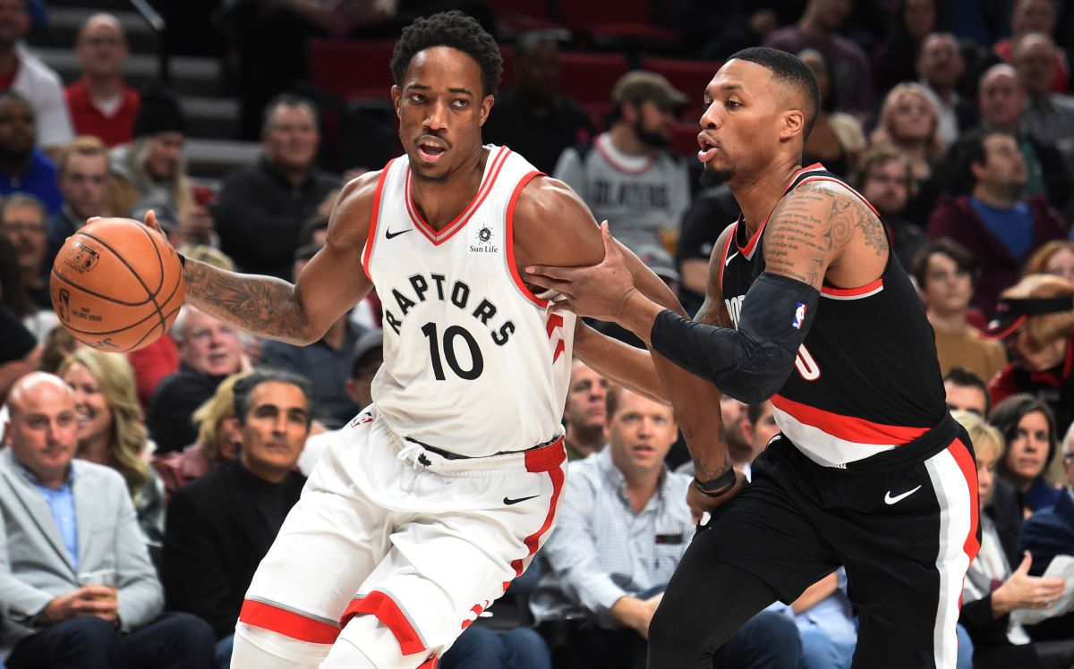 DeMar DeRozan切入對抗Damian Lillard 。（圖／美聯社／達志影像）
