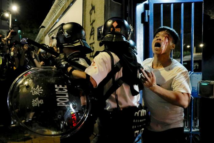 ▲中國大陸官媒力挺香港警察。（圖／美聯社／達志影像）