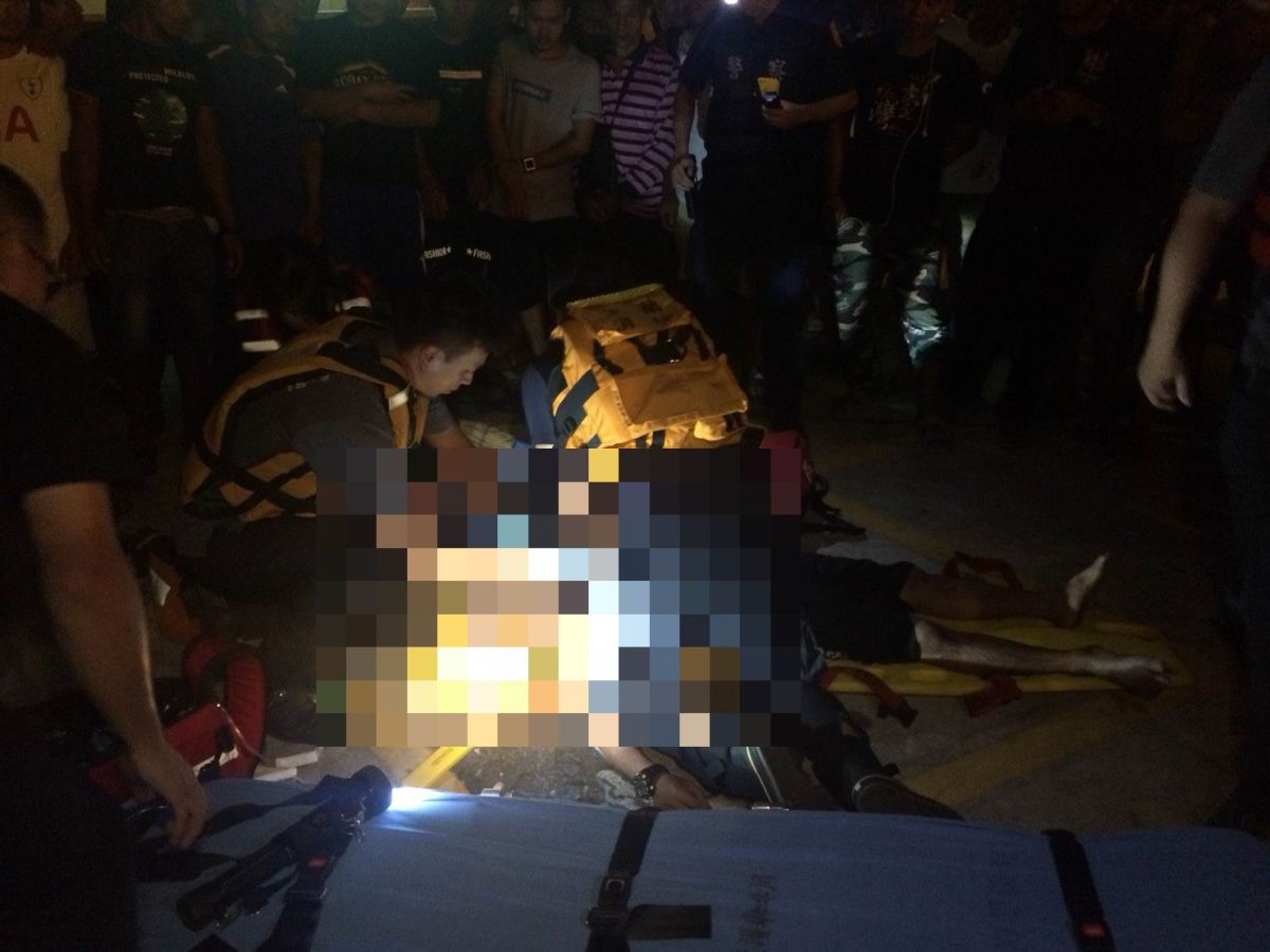 ▲一名外籍漁工在南方澳第三漁港不慎跌落海中，消防人員正在進行急救。（圖／宜蘭縣消防局提供)