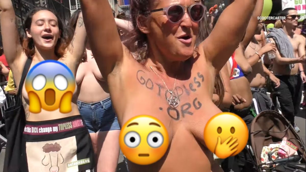 ▲如果走在大街上，看到一群男女赤裸上身向你走來，當下的反應應該很傻眼。（圖／翻攝自影片）