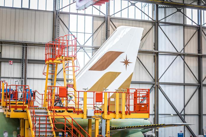 ▲星宇航空今（ 2 ）日於臉書粉絲團公布，首架 A321neo 客機的垂直尾翼已順利完成商標塗裝。（圖／星宇航空）