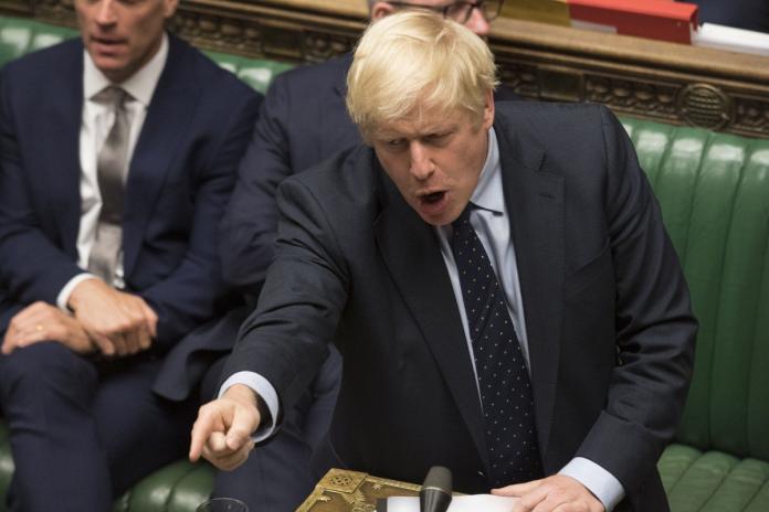 ▲英國首相強生（Boris Johnson）3 日於國會表決失利，失去脫歐主導權，讓他氣得 4 日在國會大罵在野工黨黨魁柯賓（Jeremy Bernard （圖／達志影像／美聯社）
