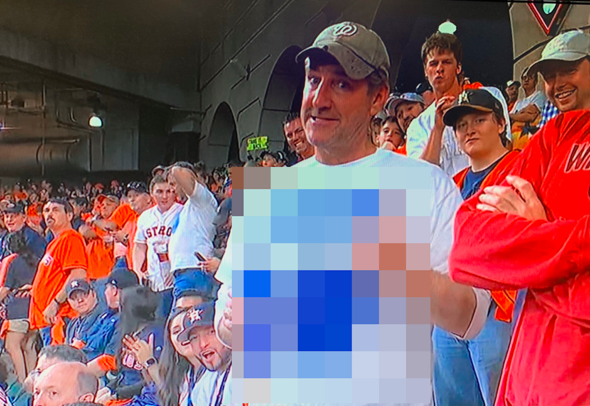 球迷Jeff Adams因為拯救手中啤酒爆紅。(圖／翻攝自網路)