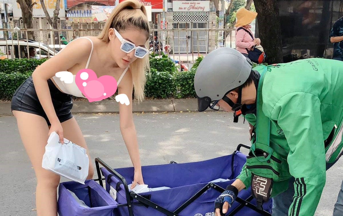 ▲試圖使人分心！越南正妹腰一彎「雪球」乍現，男孩全嗨翻。（圖／翻攝自批踢踢）