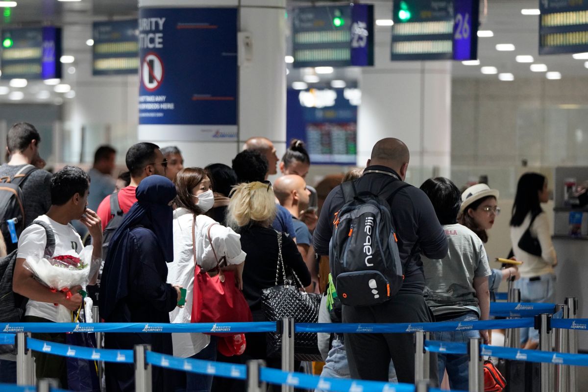 ▲馬來西亞25日通報境內首批2019新型冠狀病毒（2019-nCoV，武漢肺炎）確診病例，有3人罹病。圖為吉隆坡國際機場入境處。（圖／美聯社／達志影像）