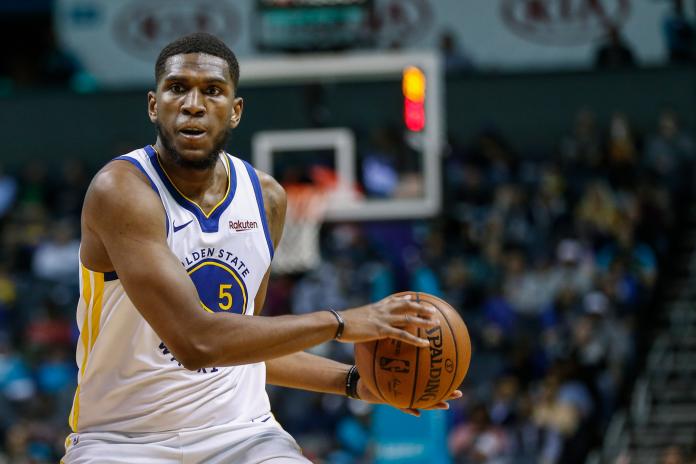 Golden State Warriors forward Kevon Looney in action against the Charlotte Hornets in the second half of an NBA basketball game in Charlotte, N.C., Wednesday, Dec. 4, 2019. Charlotte won 106-91. (AP Photo/Nell Redmond)