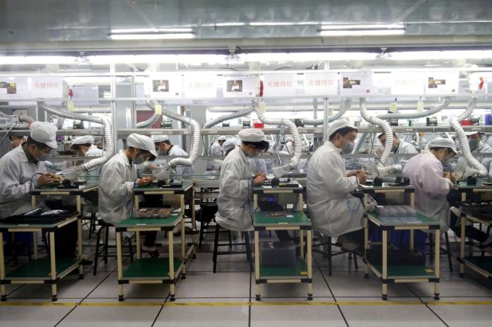 ▲鄭州富士康生產了全球大約一半的蘋果手機。（圖／翻攝中新社）