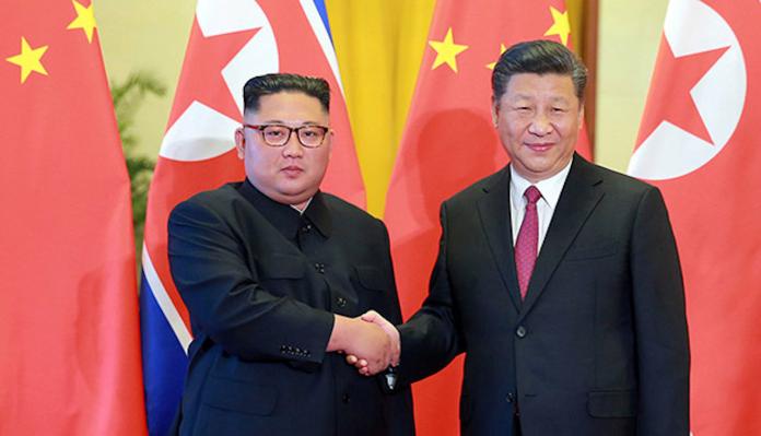 ▲北韓領導人金正恩（左），中國大陸國家主席習近平（右）。（圖／翻攝自《澎湃新聞》）