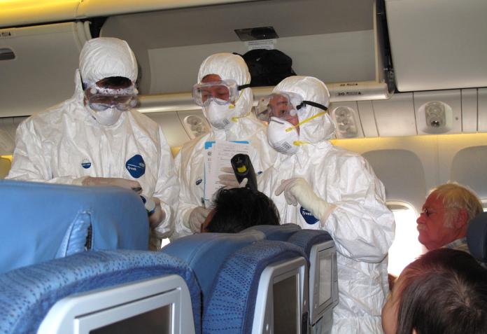 搭飛機戴口罩也不安全？專家分析：空調、用餐是關鍵
