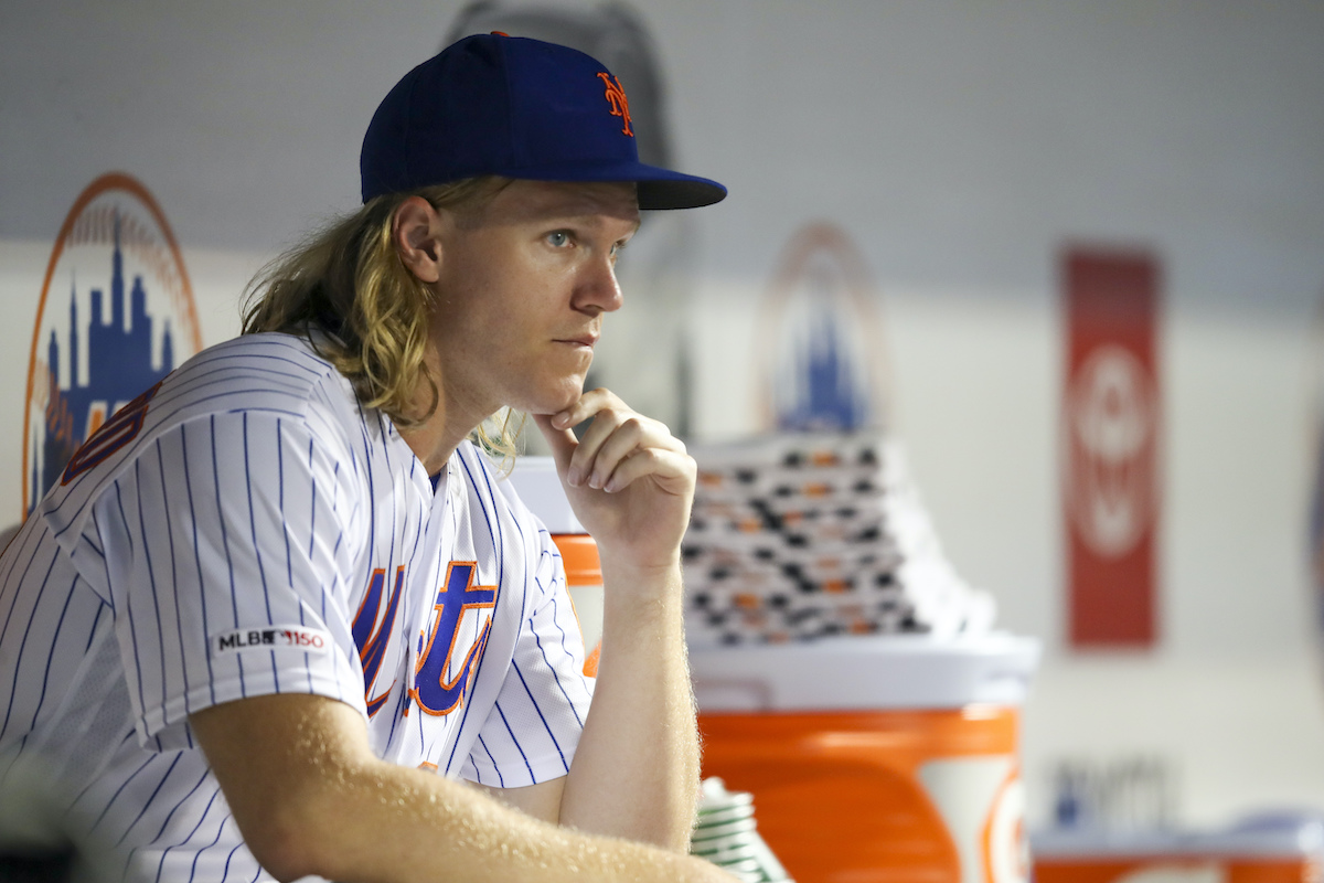 New York Mets starting pitcher Noah Syndergaard watches during the fourth inning of the team's baseball game against the Los Angeles Dodgers on Friday, Sept. 13, 2019, in New York. (AP Photo/Mary Altaffer)