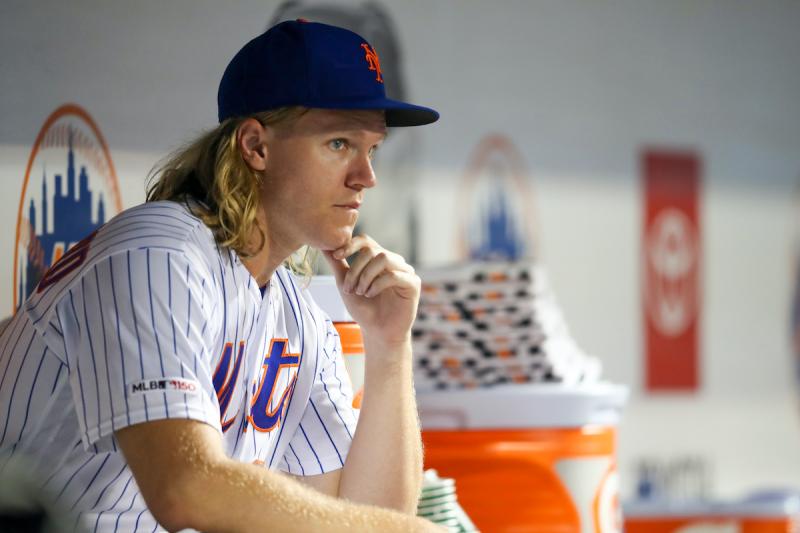 New York Mets starting pitcher Noah Syndergaard watches during the fourth inning of the team's baseball game against the Los Angeles Dodgers on Friday, Sept. 13, 2019, in New York. (AP Photo/Mary Altaffer)