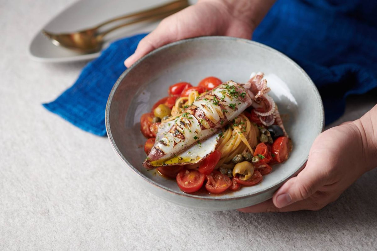 ▲台中知名歐式餐廳「鹽與胡椒」，參與聯合行銷端出招牌菜是南義經典名菜煙花女義大利麵食。（圖／業者提供） 