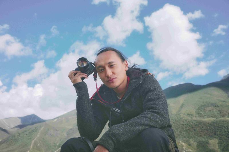 ▲Pawo是不丹的知名攝影師、編劇及導演。出身貴族的他,父親曾是不丹駐科威特外交官。(圖/海鵬)