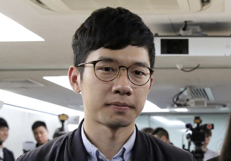 ▲香港眾志前主席羅冠聰認為,台諜案也是變相警告香港人,在完全缺乏法治的中共下,沒有人是安全的。資料照。(圖/美聯社/達志影像)