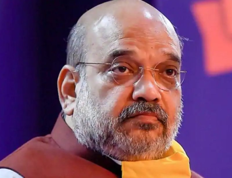 ▲印度內政部長夏哈確診感染新冠肺炎。他過去曾被數度拍到將口罩褪至下巴處，遭質疑並無落實防疫措施，但未能完全證明就是其染疫的原因。（圖／翻攝自印度斯坦時報）