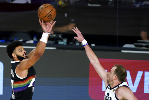 ▲金塊隊Jamal Murray出手（左）（圖／美聯社／達志影像）