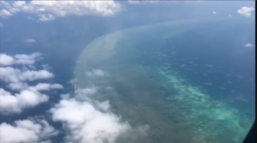 ▲國民黨立委陳玉珍指控民進黨立委王定宇，在2018年考察時拍下東沙島的外觀，才是洩密。 (圖/翻攝王定宇臉書影片)