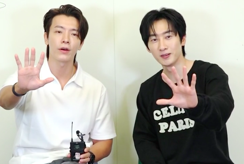 ▲東海（左）跟銀赫錄影問候台灣老婆，銀赫控訴對方太霸道，要負起責任。（圖／avex taiwan）
