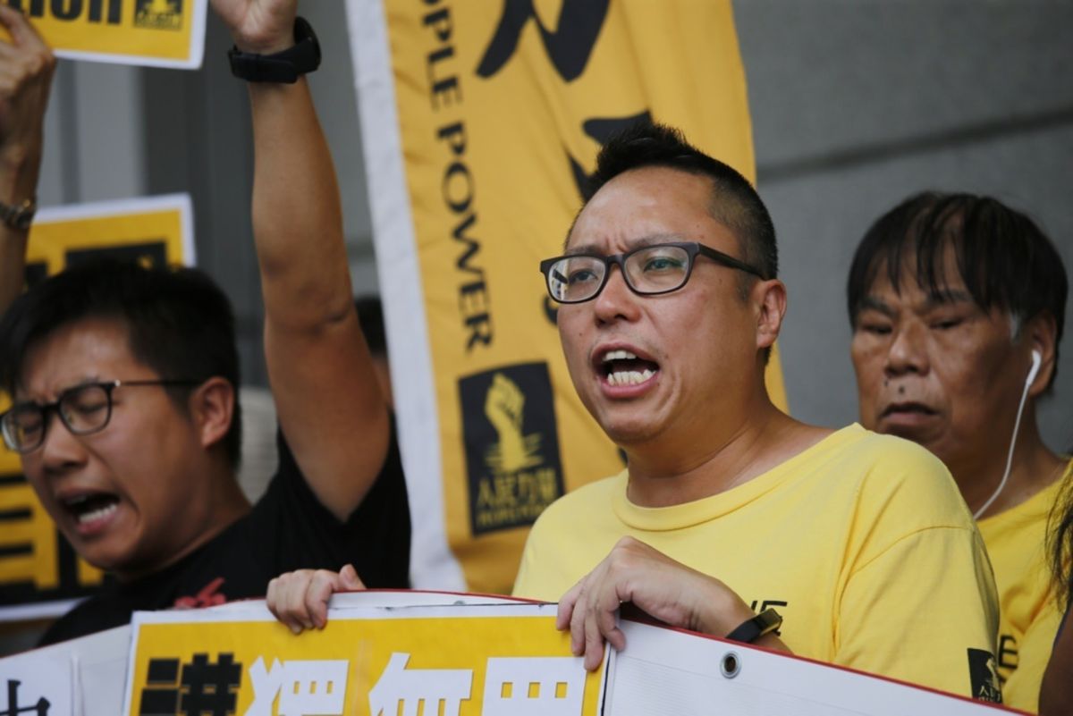 ▲泛民派政黨「人民力量」副主席譚得志，9月6日上午於住處被警方拘捕，國安處指譚涉嫌發表言論煽動他人厭惡政府。（圖／翻攝自《香港01》）