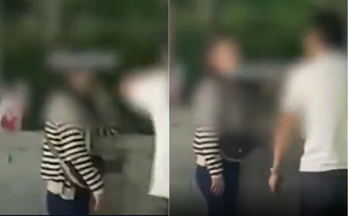 ▲近期陸網上流傳一段片段，一名身穿白色上衣的男子，在路邊指著女友的鼻子破口大罵，還動手賞巴掌。（圖／翻攝微博）