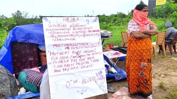 ▲印度喀拉拉邦傳出一名單親媽媽，為了付出子女的醫藥費貼出廣告要賣出自己所有的器官。（圖／翻攝自Kerala Kaumudi）