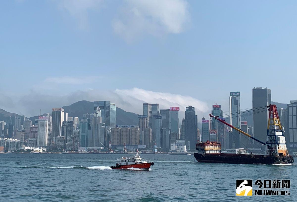 ▲香港內部動盪，不僅資金出走，亞太金融中心地位也面臨考驗，但銀行業認為短期內香港金融中心地位仍難以被取代。（圖／記者顏真真攝）