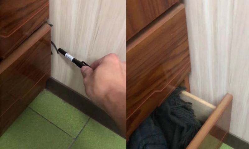 ▲有名男網友以為有大蜘蛛在衣櫃牆角,豈料,戳牠卻不會動,一打開衣櫃才發現原來「誤會大了」。(圖/翻攝自《爆廢1公社》)