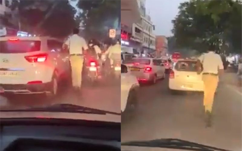 ▲一名印度交警在交通繁忙的時段為救護車一路開路。（圖／翻攝自推特）